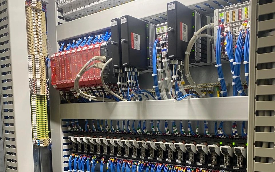 Beckhoff-based control cabinet built by RTC — EtherCAT terminals, safety module and dressed wiring