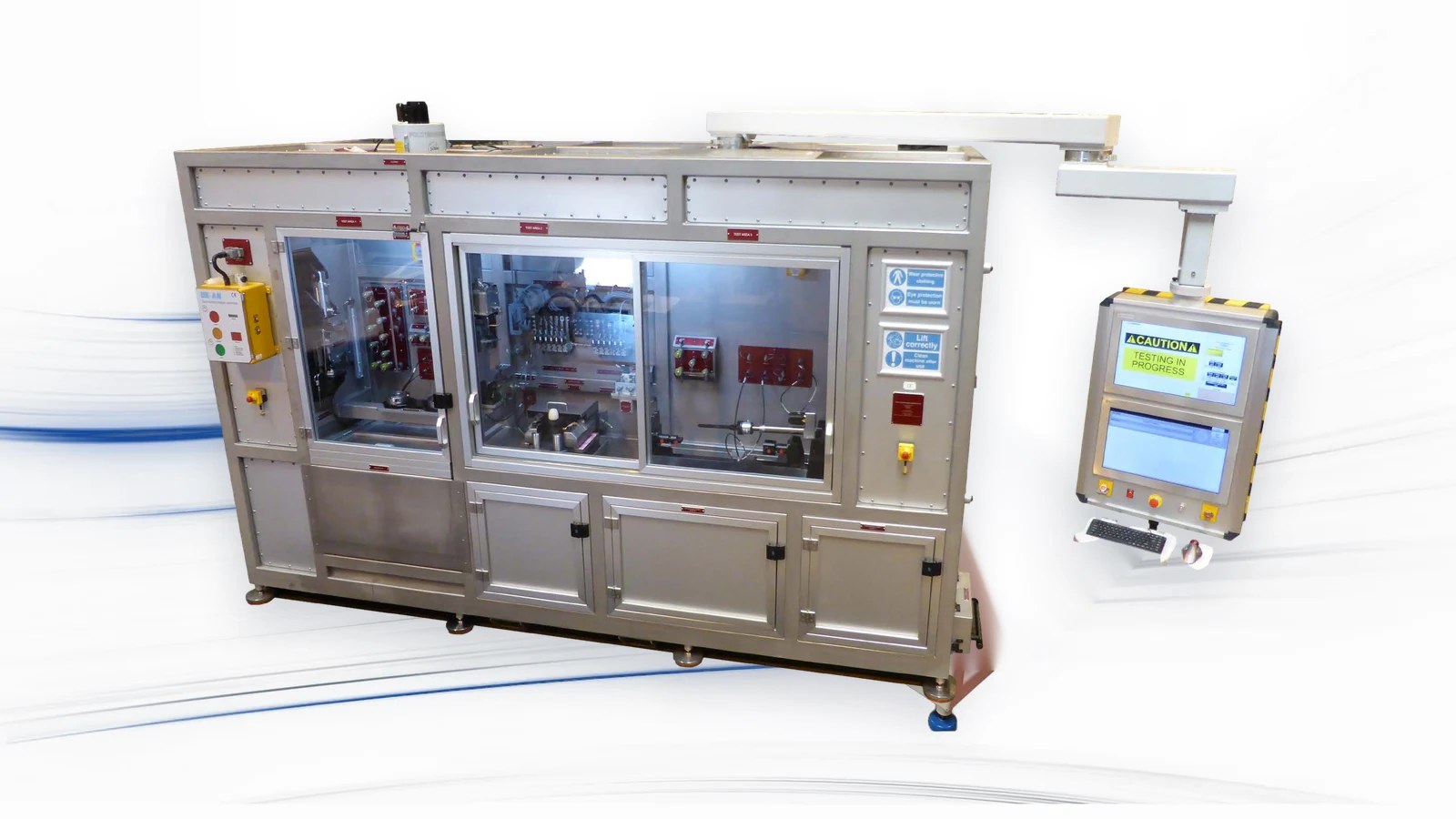 Multi-station flow bench test rig with operator HMI console — an electro-hydraulic test system built through the Integrated Test Systems group